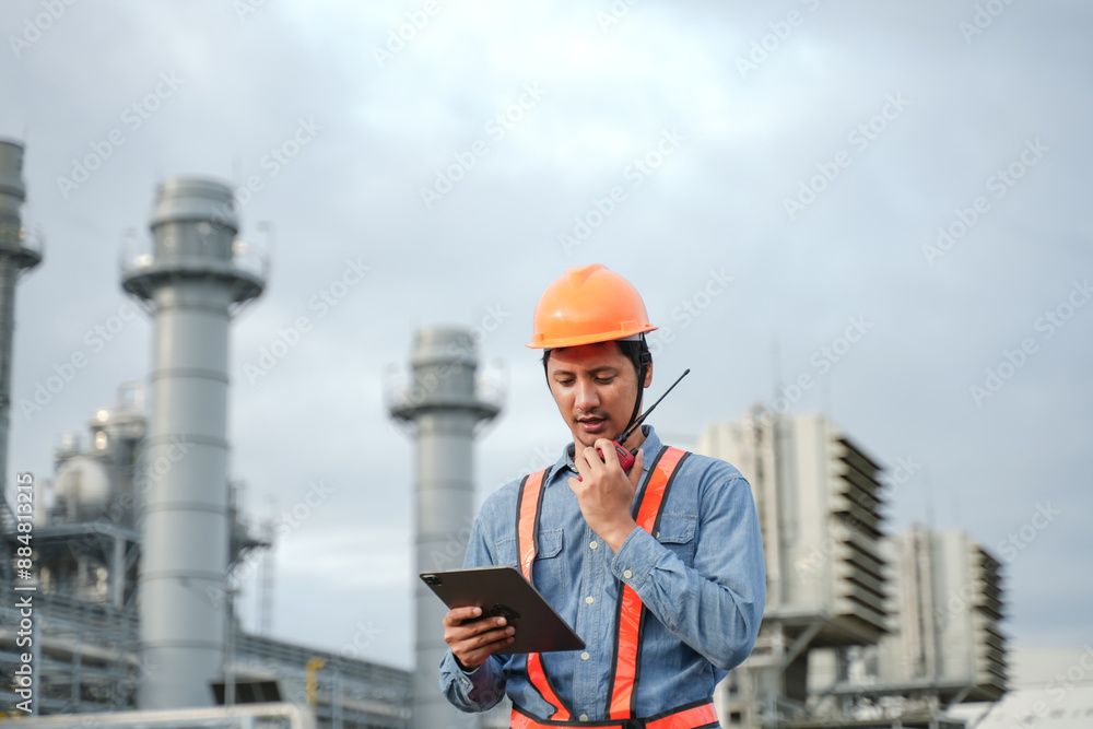 Engineering using digital tablet for working on construction site of the power plant. Engineering using digital tablet for working on construction site of the power plant.