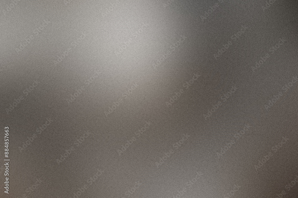 Softly lit smooth metallic gradient background with a grainy texture