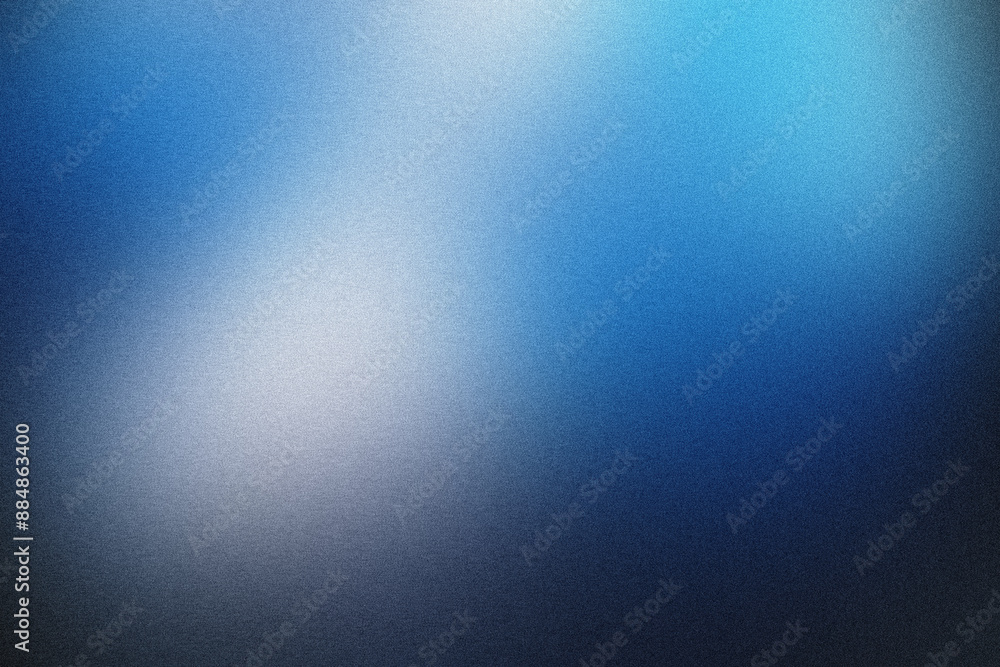 Abstract blue background with a grainy texture fading to white Abstract blue background with a grainy texture fading to white