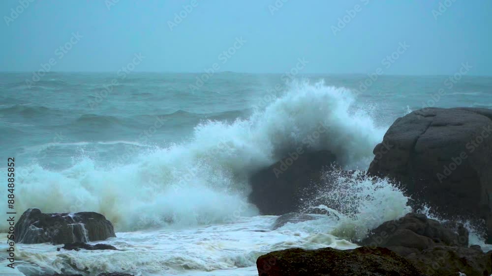 Storm swell waves crashing into the shore Storm swell waves crashing into the shore