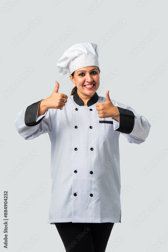 Asian Indian Female Chef with Thumbs Up - Isolated on White Asian Indian Female Chef with Thumbs Up - Isolated on White