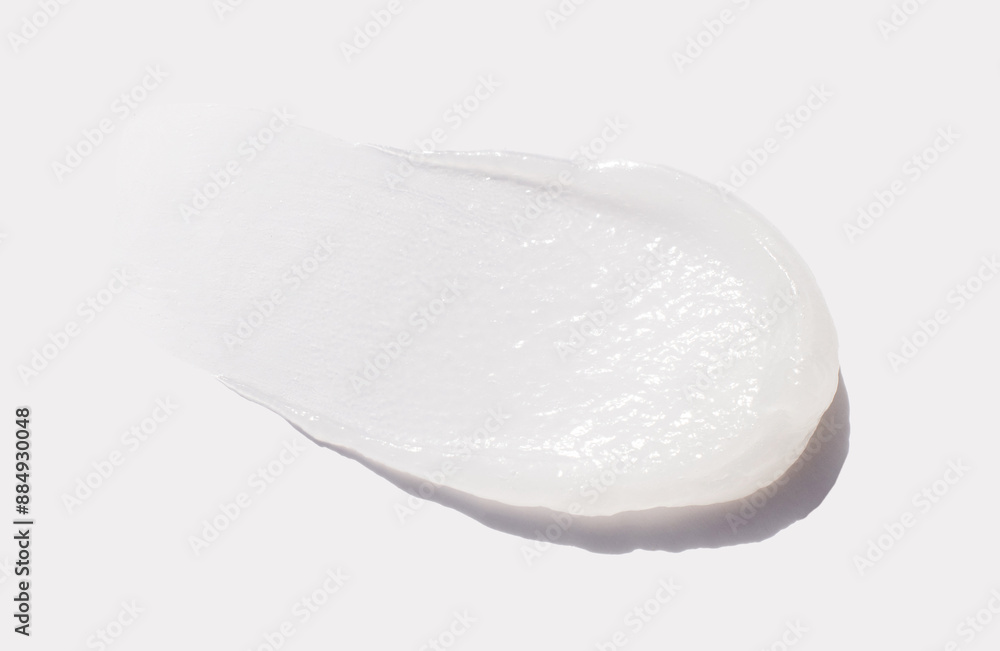 sample smear of cosmetic peeling gel on a light gray background close-up sample smear of cosmetic peeling gel on a light gray background close-up
