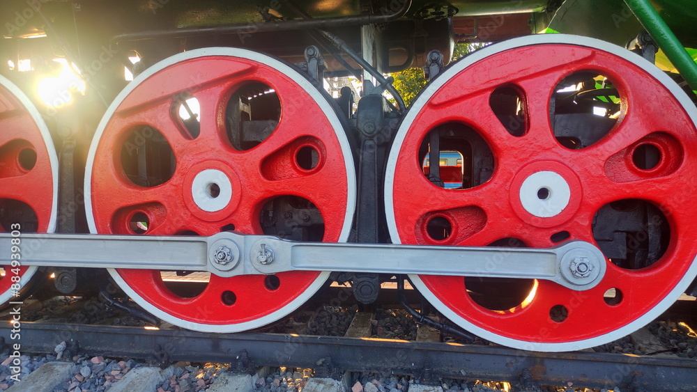 Old steam train locomotive wheels drive closeup