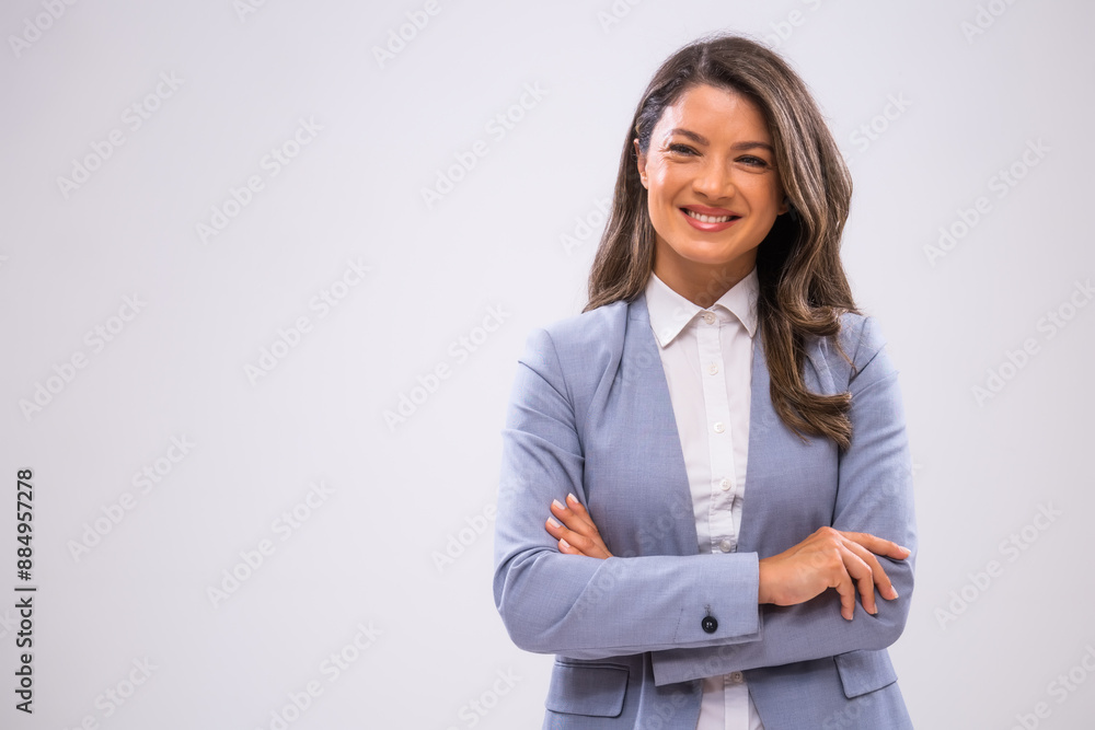 Portrait of cheerful businesswoman who is looking away and smiling.