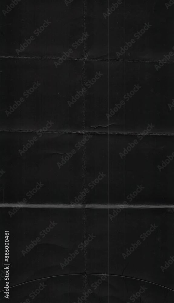 Fototapeta premium texture scan of folded black paper, cool poster overlay element.