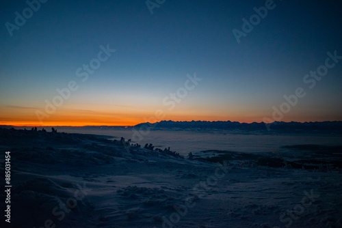 sunrise over the Tatra Mountains and snowy mountain peaks