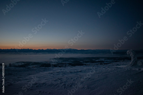 sunrise over the Tatra Mountains and snowy mountain peaks