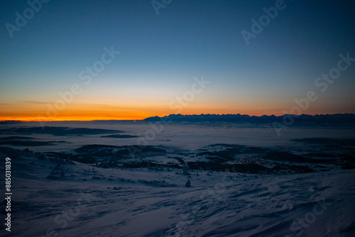 sunrise over the Tatra Mountains and snowy mountain peaks