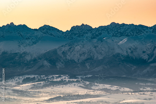 Fototapeta Naklejka Na Ścianę i Meble -  sunrise over the Tatra Mountains and snowy mountain peaks