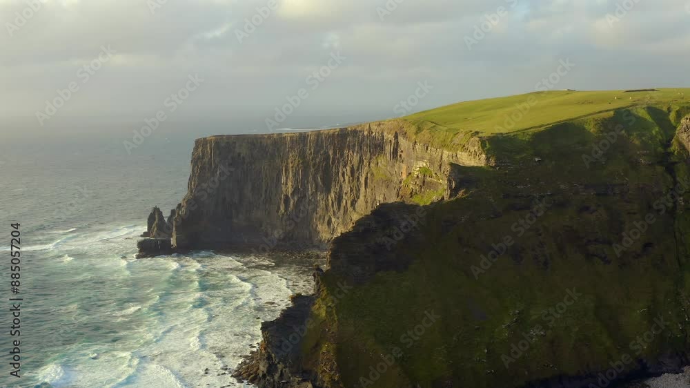 Northern Cliffs of Moher, windy and wavy evening, aerial view Northern Cliffs of Moher, windy and wavy evening, aerial view
