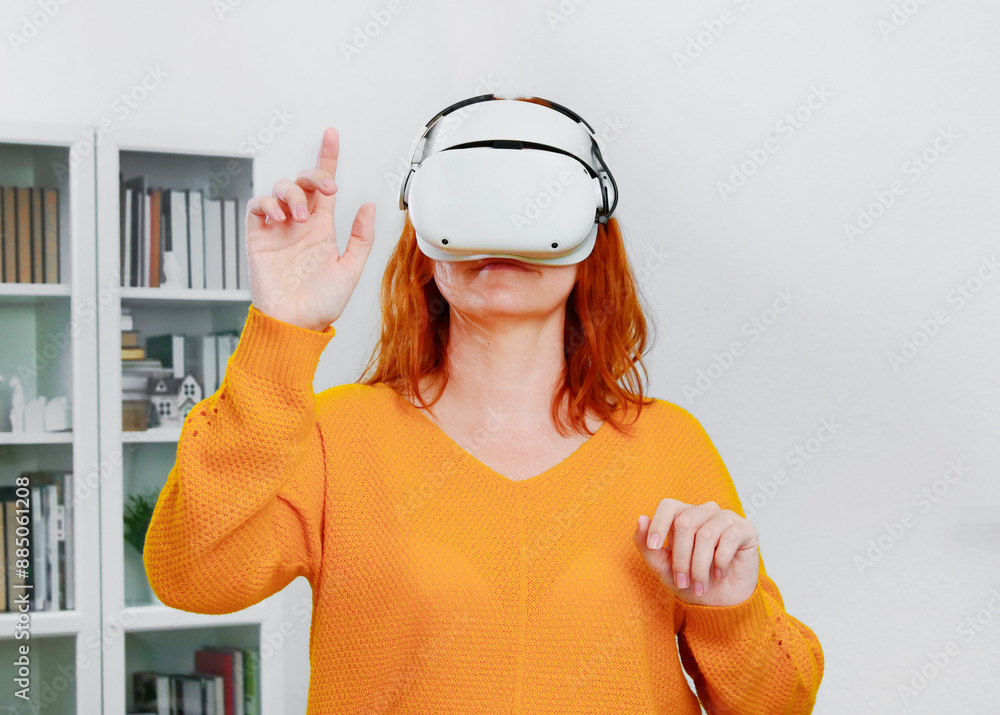 woman playing VR glasses. Sport in virtual reality. The concept of metaverse, virtual reality, future, technology and internet of things.