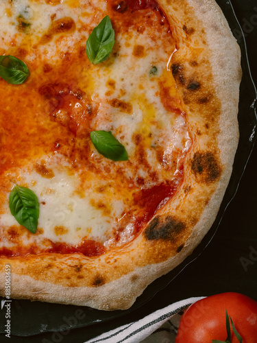 Delicious Neapolitan pizza Margherita close-up, top view