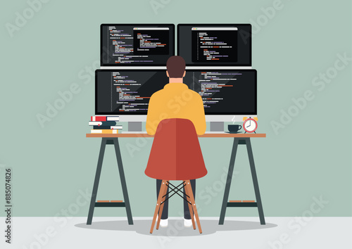 Programmer working writing code on computer