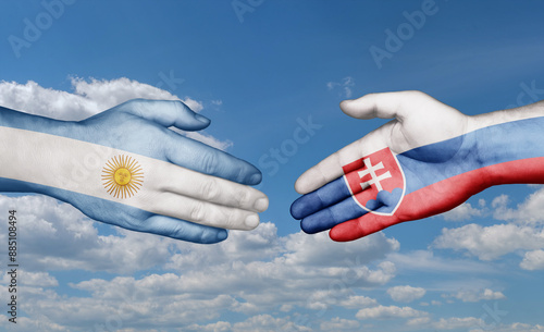 Photography Slovak Republic or Slovakia and Argentina country handshaking with flags, consen