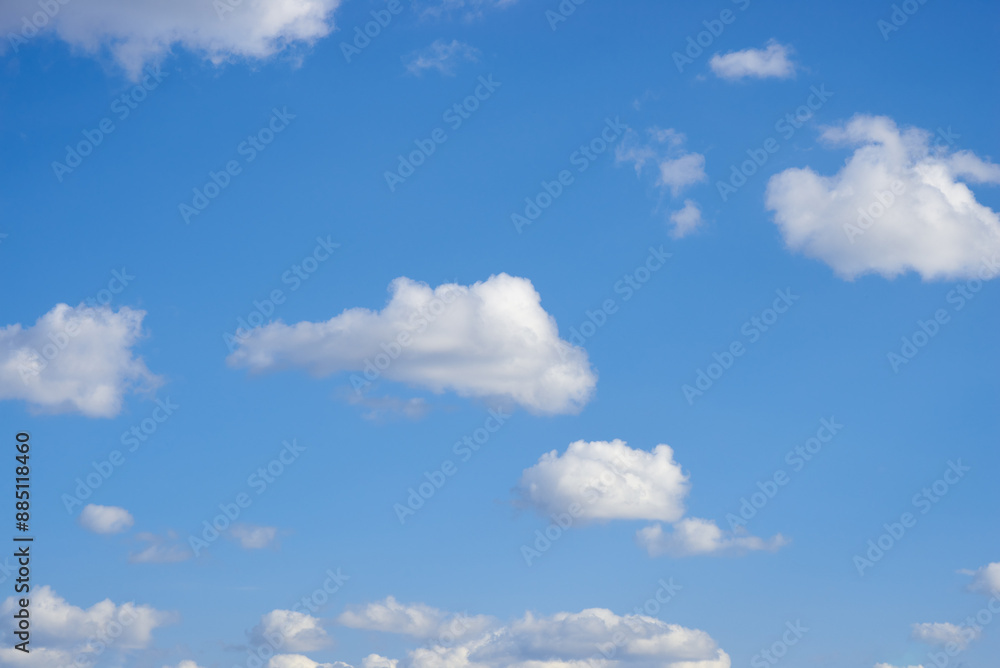 Fototapeta premium white clouds against a blue sky on a sunny day