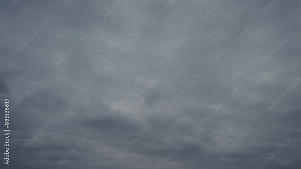 Time lapse, Nimbostratus clouds coming from the horizon in anticipation of rain Time lapse, Nimbostratus clouds coming from the horizon in anticipation of rain