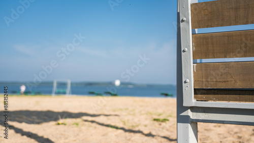 Bench on the background of the beach and lake in the early morning © Давид Воробьёв