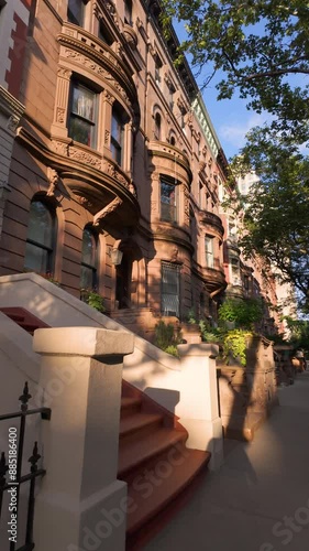 Brownstones with stoop steps in Central Park West Historic District. Row of Townhouses on Upper West Side, Manhattan, New York City