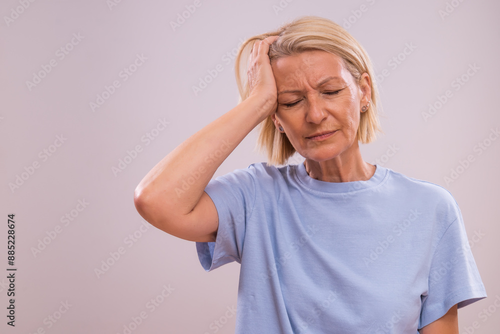 Mature woman is having a headache. Mature woman is having a headache.
