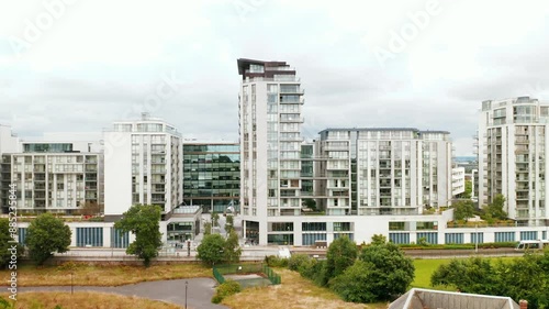Aerial view of a modern apartment complex in Leopardstown, Dublin, showcasing contemporary architecture and green surroundings. Ideal for real estate and urban development themes.