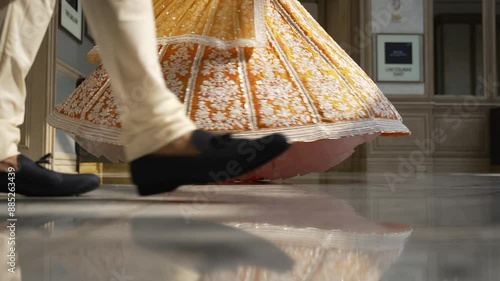 Traditional Indian dancer in gold costume with golden embroidery