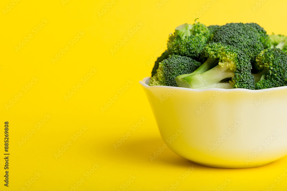 broccoli of fresh green broccoli in bowl over coloredbackground. , close up. Fresh vegetable