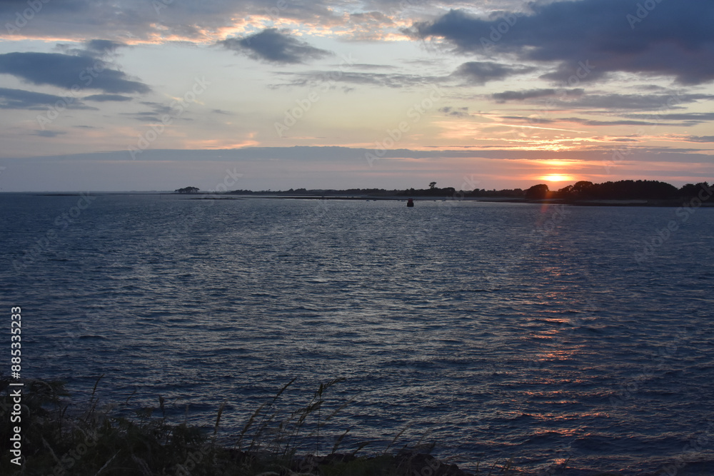 sky and setting cloud. sunset over port navalo golf du morbihan france, beauty of morbihan golf.
sky and setting cloud. sunset over port navalo golf du morbihan france, beauty of morbihan golf.