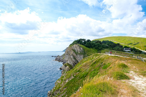 Jurassic coast view in Dorset near Lulworth Cove. Lulworth Cove cliffs view on a way to Durdle Door. The Jurassic Coast is a World Heritage Site on the English Channel coast of southern England.Dorset photo