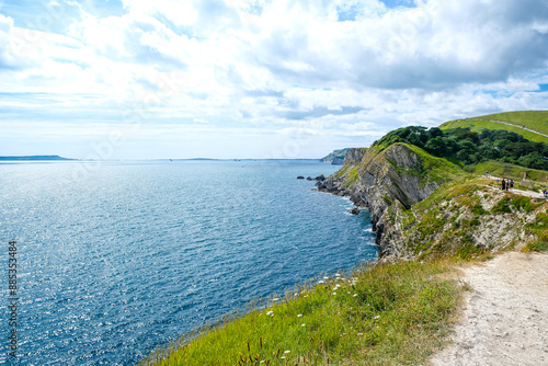 Jurassic coast view in Dorset near Lulworth Cove. Lulworth Cove cliffs view on a way to Durdle Door. The Jurassic Coast is a World Heritage Site on the English Channel coast of southern England.Dorset photo