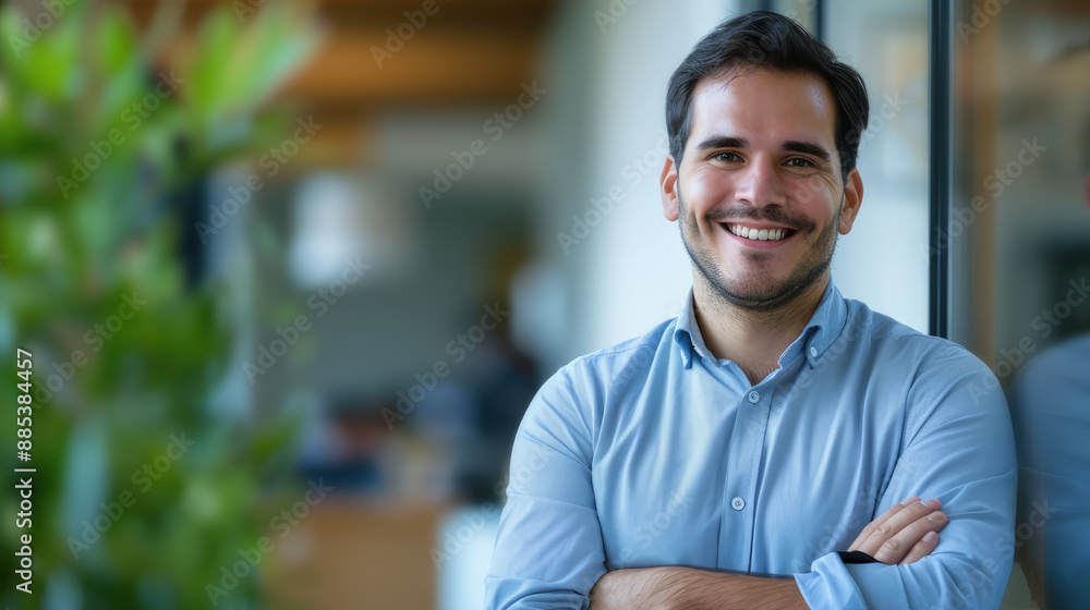 portrait of a handsome young man in a blue shirt portrait of a handsome young man in a blue shirt