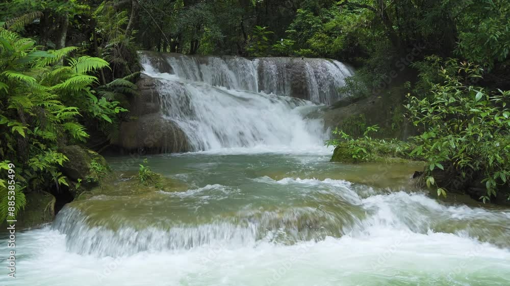 Huai Mae Khamin Waterfall, second level, wild tropical forest in National Park, Kanchanaburi, Thailand Huai Mae Khamin Waterfall, second level, wild tropical forest in National Park, Kanchanaburi, Thailand