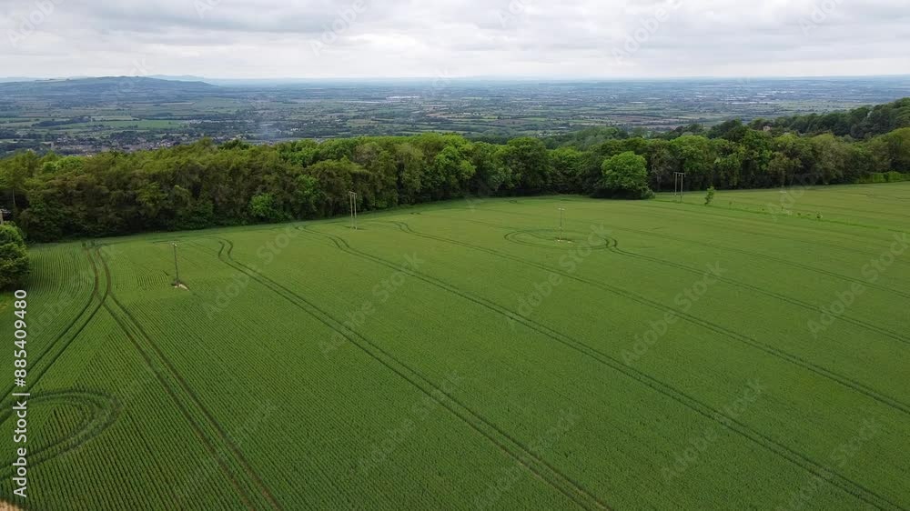 Flight over green agricultural fields, Cotswolds, England Flight over green agricultural fields, Cotswolds, England