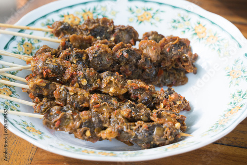 an Indonesian dish called sate kerang. photo