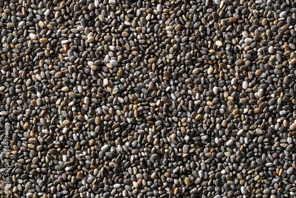 Texture or background of chia seeds. Healthy superfood concept, closeup, top view Texture or background of chia seeds. Healthy superfood concept, closeup, top view