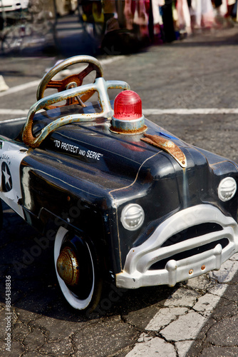 old fashioned Police themed pedal car toy photo