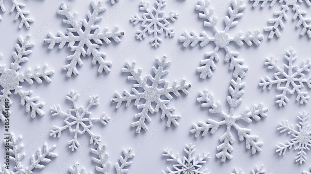 Close-up of intricate snowflakes on a snowy surface, creating a winter wonderland scene. Close-up of intricate snowflakes on a snowy surface, creating a winter wonderland scene.