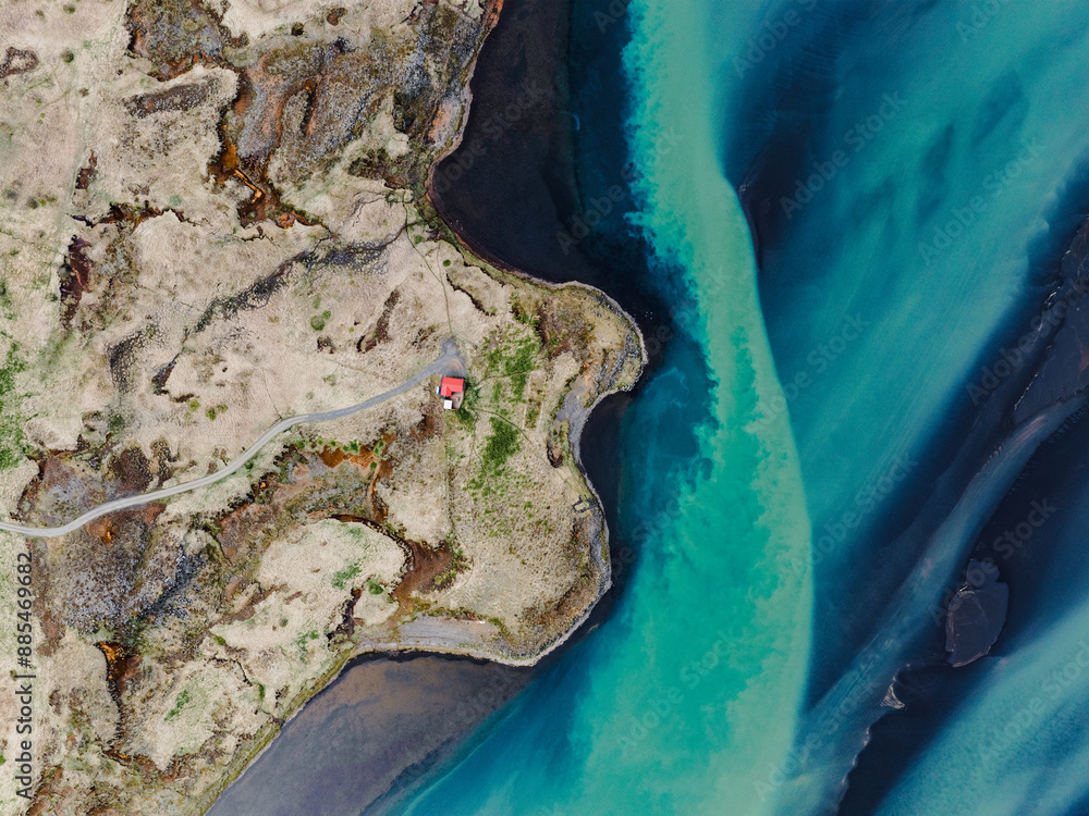 View from above, stunning patterns created in the volcanic sands of Iceland. As glaciers melt the water flows as rivers out to sea. Natural pattern, background, wallpaper.