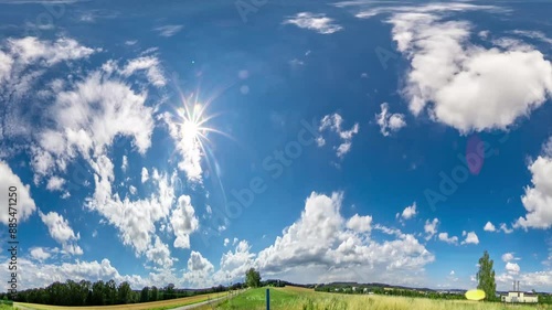 timelapse of sunny summer landscape with white clouds 360° panorama