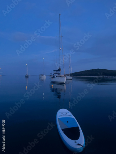 paddleboard with anchorage yachts on the background