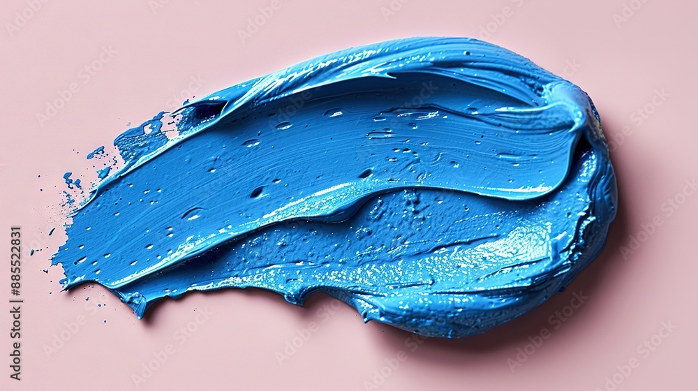 Blue paint with water drops on a pink background Blue paint with water drops on a pink background