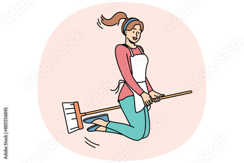 Happy woman flies on mop and smiles, for concept of joy from doing housework and cleaning apartment. Young positive girl housewife or maid sitting astride broom loves to do housework