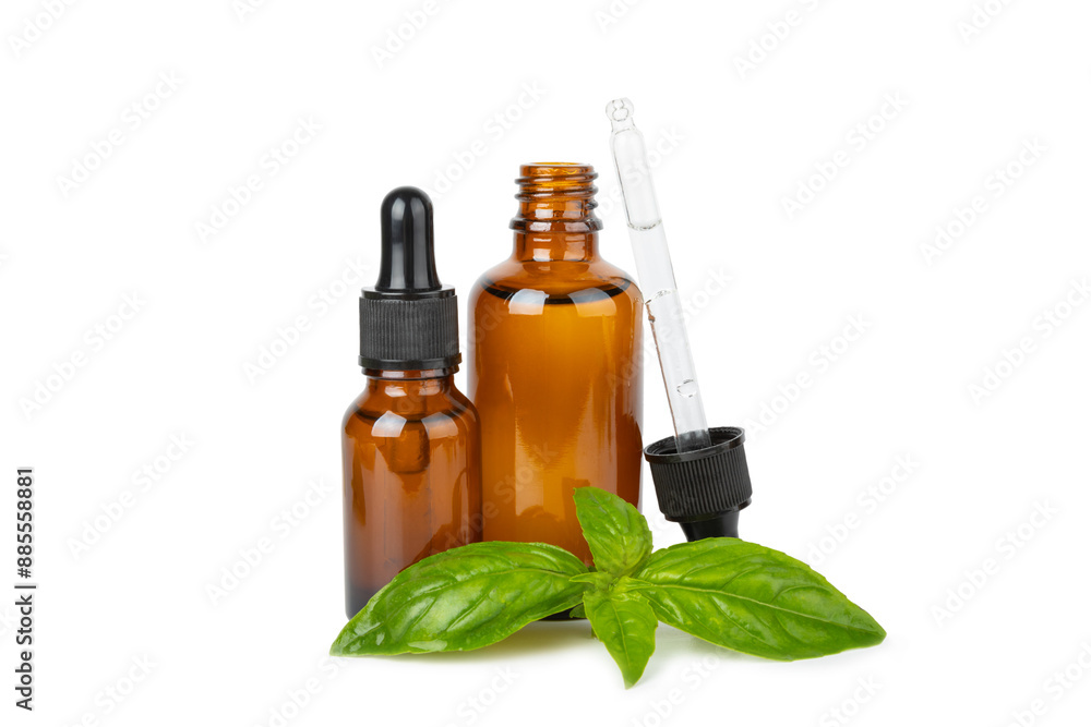 Basil essential oil isolated on white background. Basil essential oil and fresh leaves. Aromatherapy. Aroma oil. Medical herbs. Alternative medicine. Place for text. Copy space. Basil essential oil isolated on white background. Basil essential oil and fresh leaves. Aromatherapy. Aroma oil. Medical herbs. Alternative medicine. Place for text. Copy space.