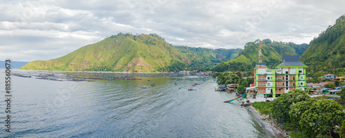Aerial drone view of small town by  Toba Lake side at Haranggaol in Simalungun, Sumatra Utara, Indonesia