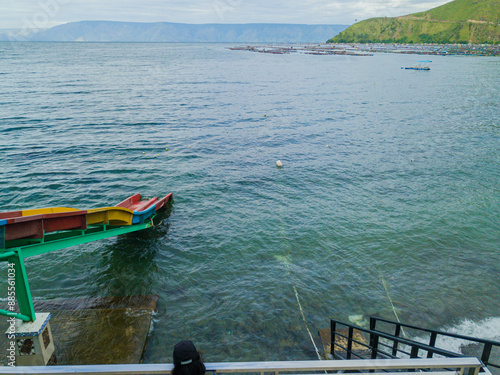 View of Toba Lake side with waterslide at Haranggaol in Simalungun, Sumatra Utara, Indonesia photo