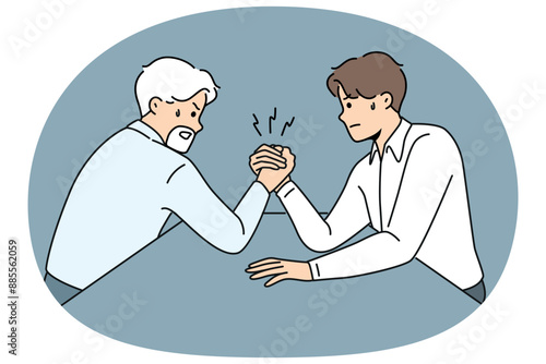 Competition of office workers of different ages doing arm wrestling to reveal strongest manager. Concept conflict between old and young employees of company and competition of experience against youth