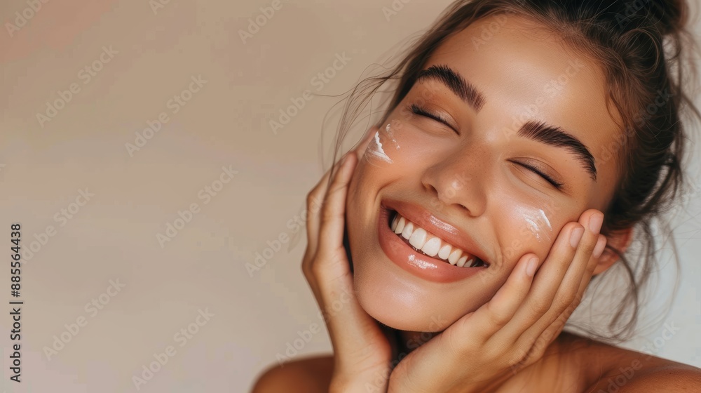 Skincare. Woman with beautiful face touching healthy facial skin. Woman smiling while touching her flawless glowy skin with copy space for your advertisement skincare Skincare. Woman with beautiful face touching healthy facial skin. Woman smiling while touching her flawless glowy skin with copy space for your advertisement skincare