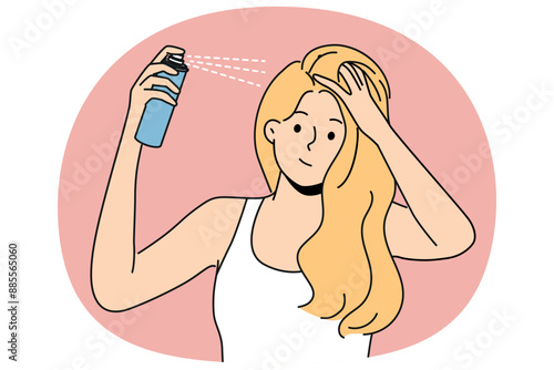 Woman puts hairspray on hair while preparing to go on date or party and wants to be most beautiful. Blonde girl uses cosmetic products for hair care, wanting to add splendor hairstyle