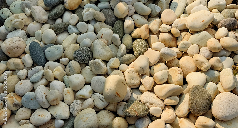 Different sizes of stones and pebbles on the beach, pebble photography Different sizes of stones and pebbles on the beach, pebble photography