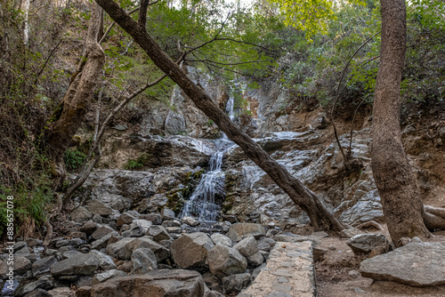 Mesa Potamos Waterfalls, 7 m high, formed at 900 m ASL, located in a hidden place and surrounded by a pine forest, near Moniatis area, Limassol mountains, near Timios Prodromas Monastery, Cyprus photo