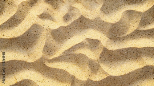 Background with clean beach sand texture top view, summer on sunny day